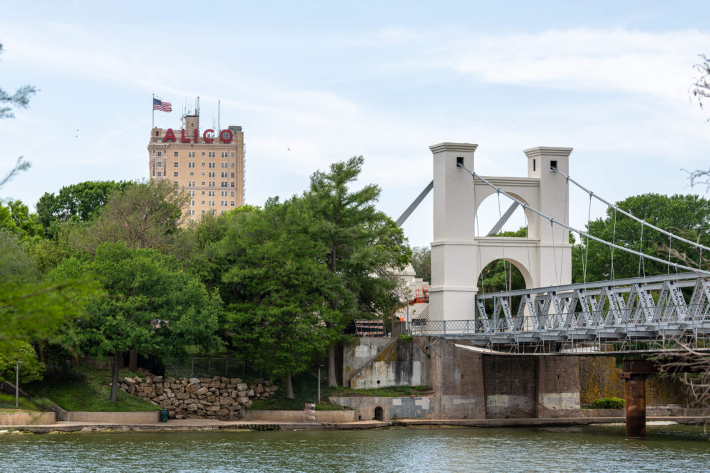Brazos River and Waco Suspension Bridge showing the outdoor lifestyle in Waco TX Brazos River and Waco Suspension Bridge showing the outdoor lifestyle in Waco TX